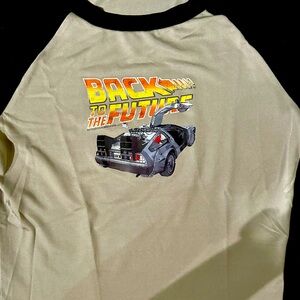Back to the Future graphic brand new “baby” tee. Never worn. No tags but mint.